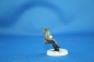 Preview: NW 037 german soldier wounded sitting on a vehicle